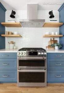 blue kitchen with stainless steel appliances