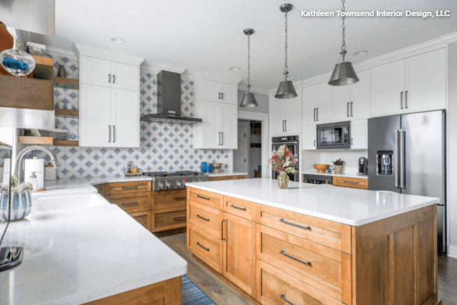 rustic kitchen with white countertops and white cabinets