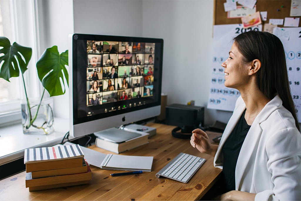 Woman working from home in zoom meeting