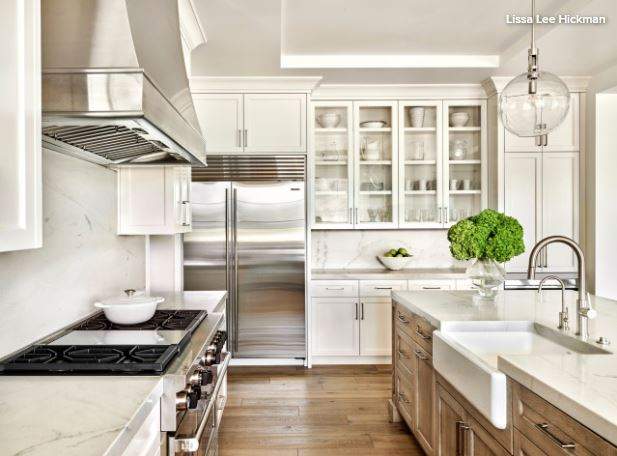 white kitchen with stainless steel appliances